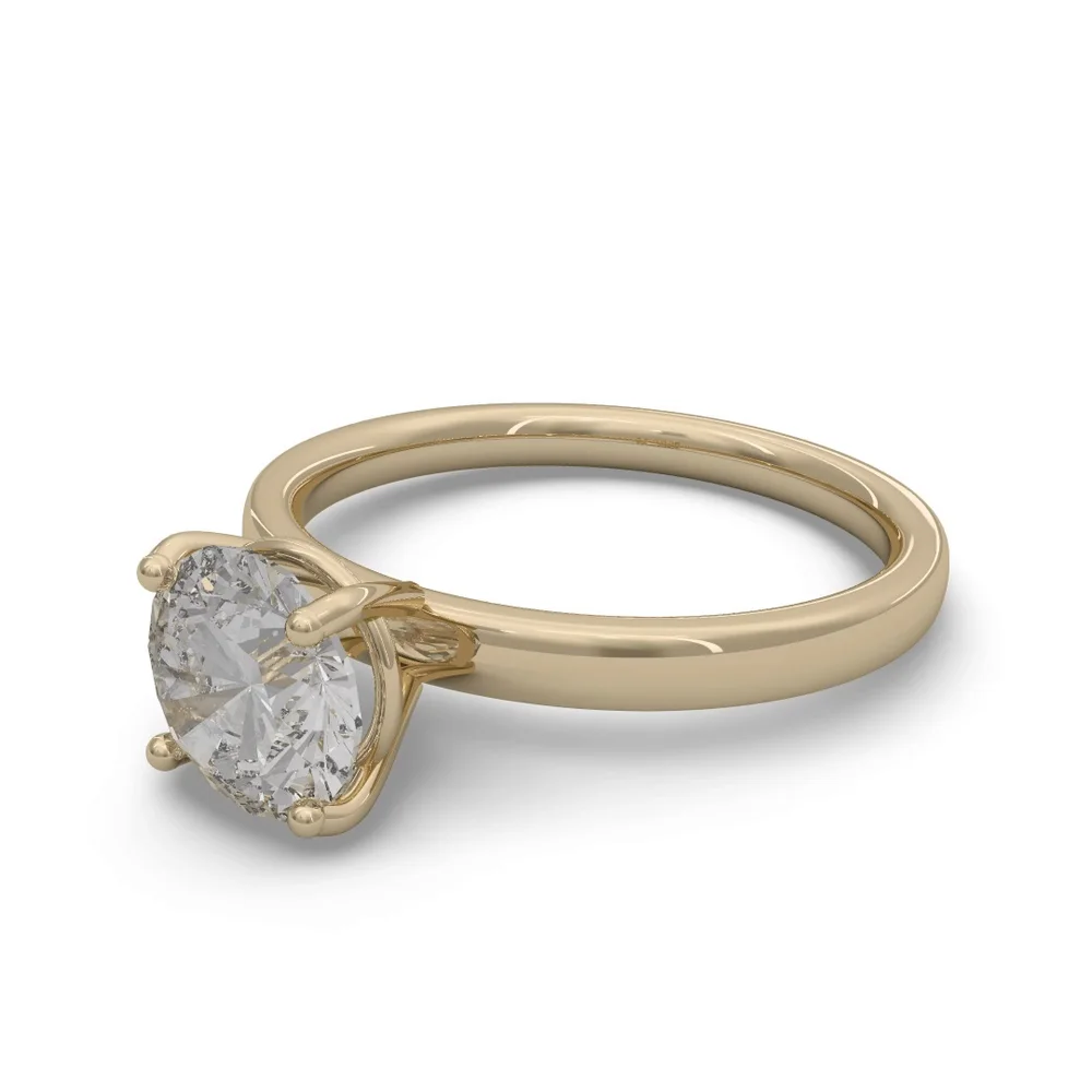 A diamond solitaire ring in yellow gold